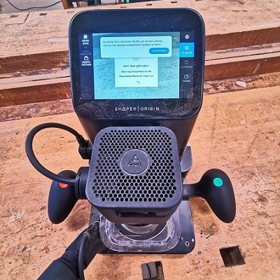 Handgeführte CNC-Fräse